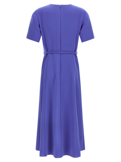 Dress by Carolina Herrera for women in polyester & polyurethane blue features an sultry silhouette defined by a crew neckline and , falling to an sultry midi for a sultry look.