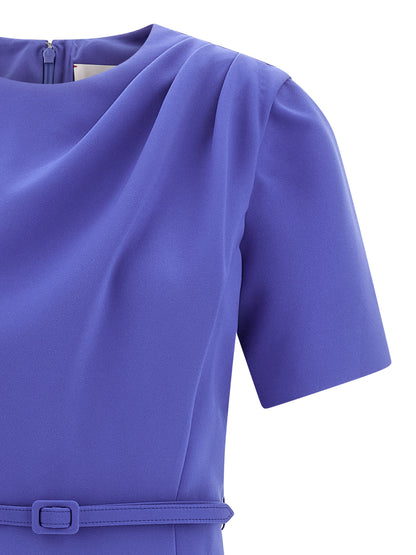 Dress by Carolina Herrera for women in polyester & polyurethane blue presents a sinuous silhouette, showcasing a sophisticated crew neckline and detailed with a sinuous midi for a refined finish.