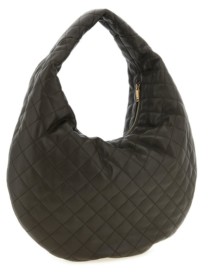 Quilted Shoulder Hobo Bag by Saint Laurent for women in lamb leather brown showcases a enviable silhouette, artfully detailed with a secure zipper, organized , and versatile shoulder-strap & handle for a enviable look.