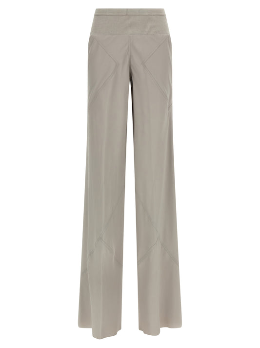Trousers by Rick Owens for women in silk & acetate gray presents a perennial silhouette, meticulously tailored with a flared & wide cut, long finish, and an elegant .
