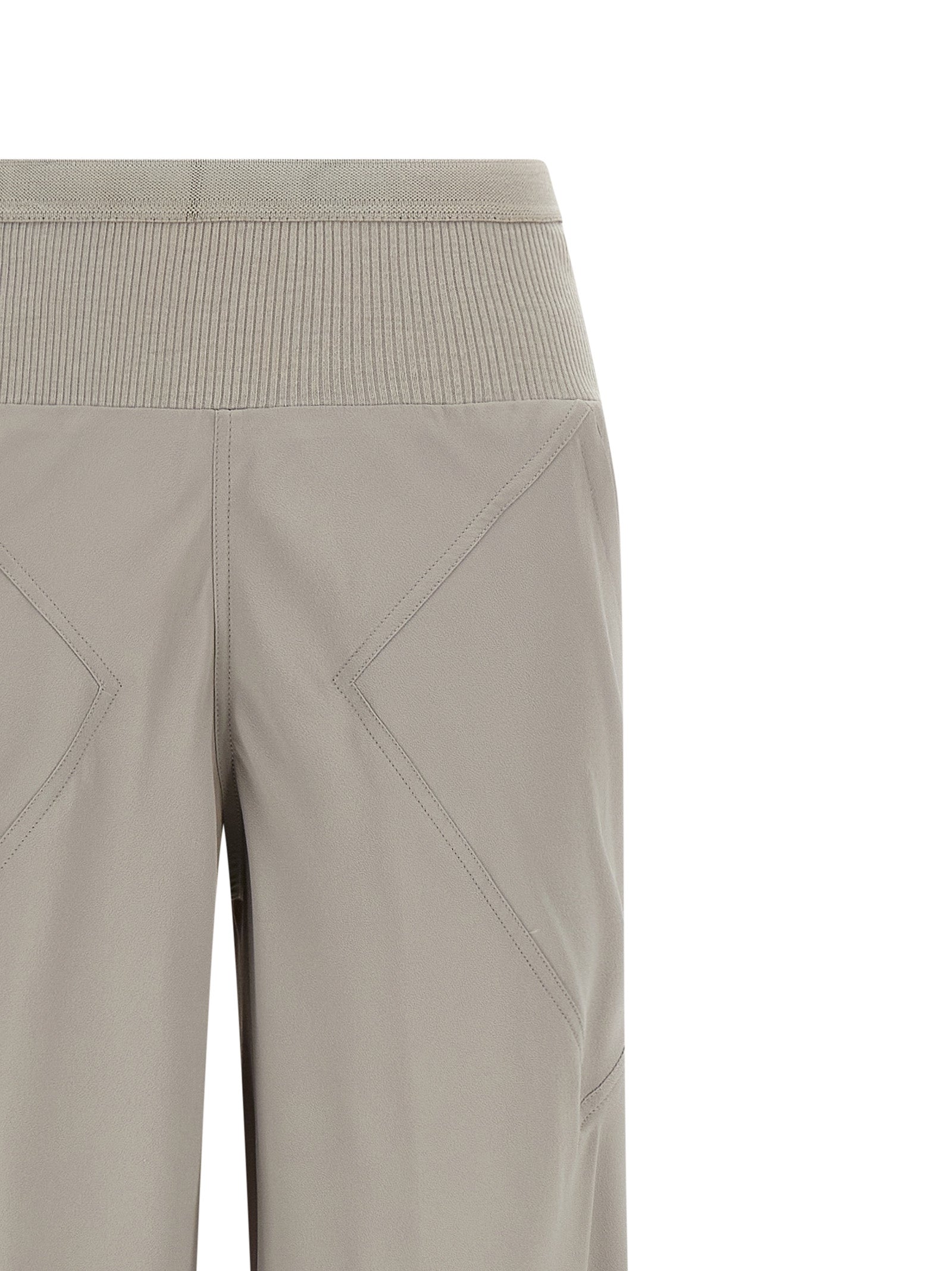 Trousers by Rick Owens for women in silk & acetate gray features a tailored silhouette with a tailored flared & wide, defined by its long and a sophisticated .