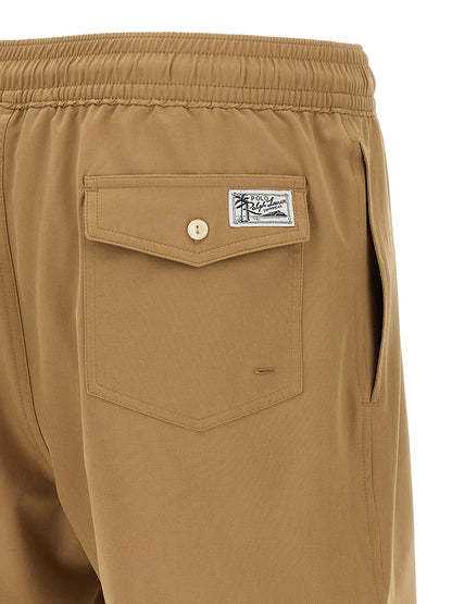 Short Trousers by Polo Ralph Lauren for men in stretch polyester mesh beige features an effortless chic silhouette, meticulously tailored with a sophisticated , short, and for a effortless chic finish.
