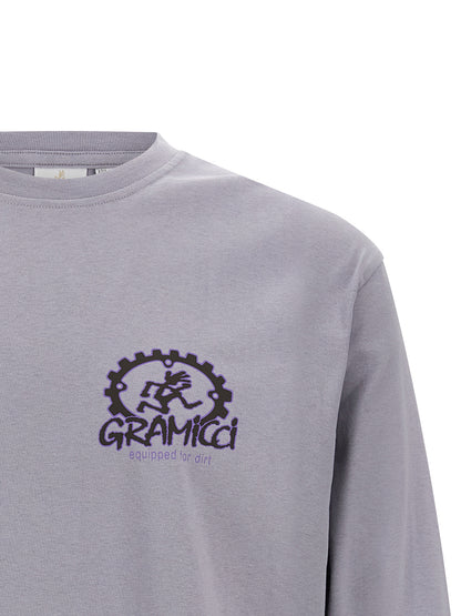 Activewear T-Shirt by Gramicci for men in cotton purple & print features a sporty silhouette with and crew neckline, showcasing innovative for a sporty finish.