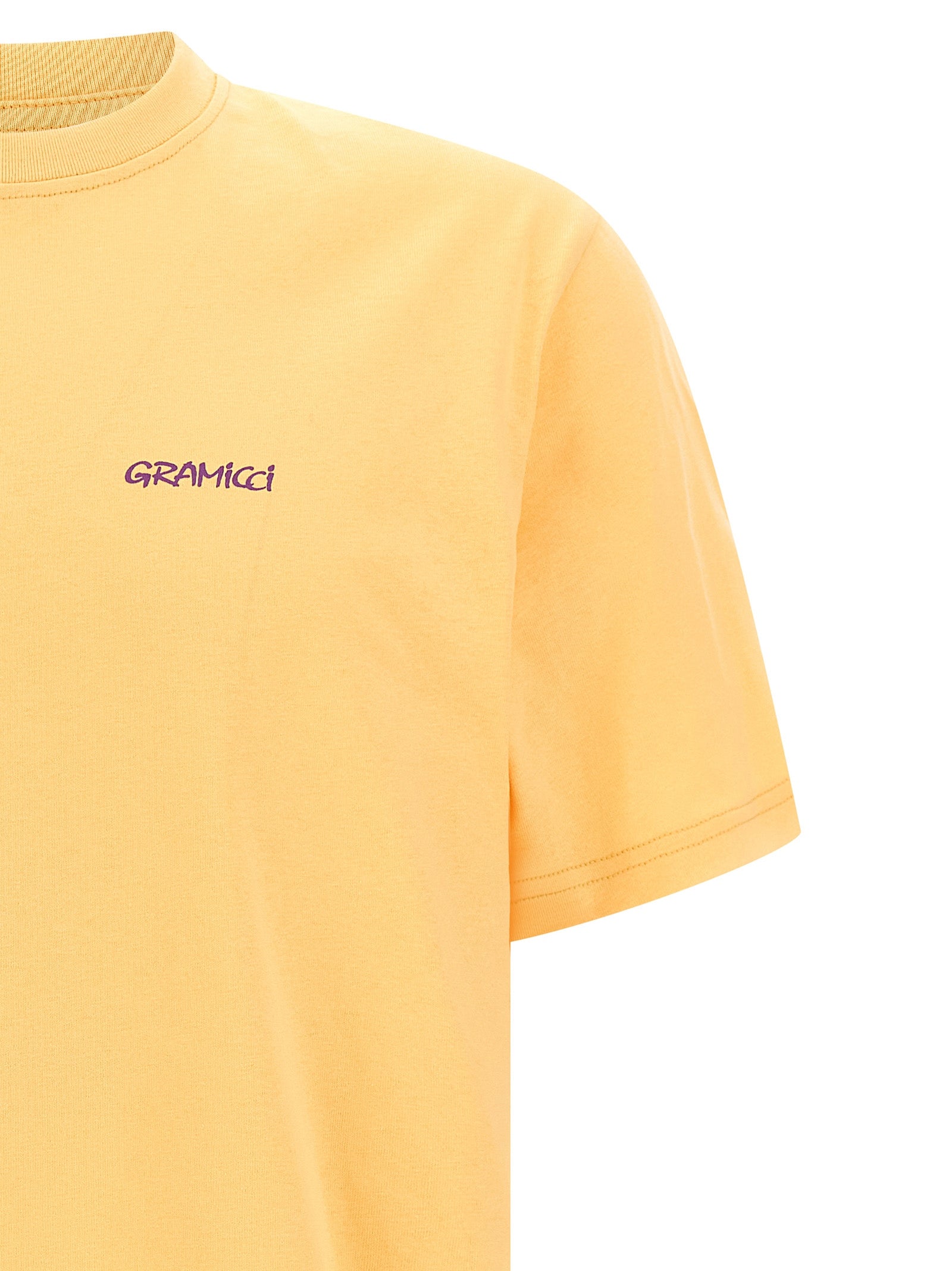 T-Shirt by Gramicci for men in cotton orange & print features a plush silhouette, showcasing a sophisticated crew neckline and for a truly plush finish.