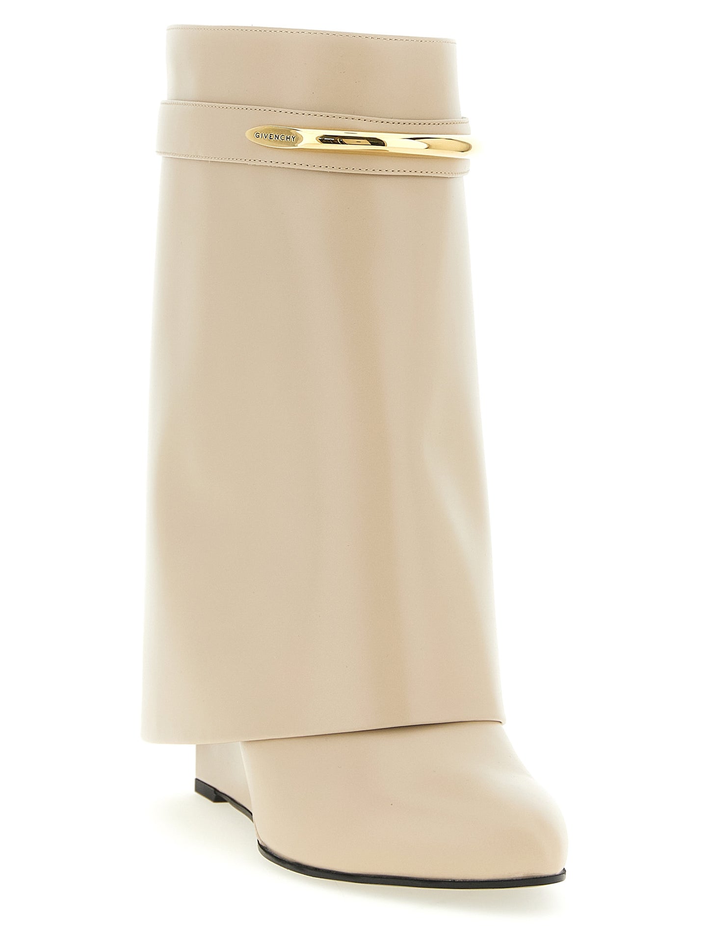 Wedge Ankle Boots by Givenchy for women in calfskin leather beige features an high-performance silhouette, showcasing the sophisticated design of the Women's Calfskin Leather Wedge Ankle Boots with a wedge and a refined pointed toe style.