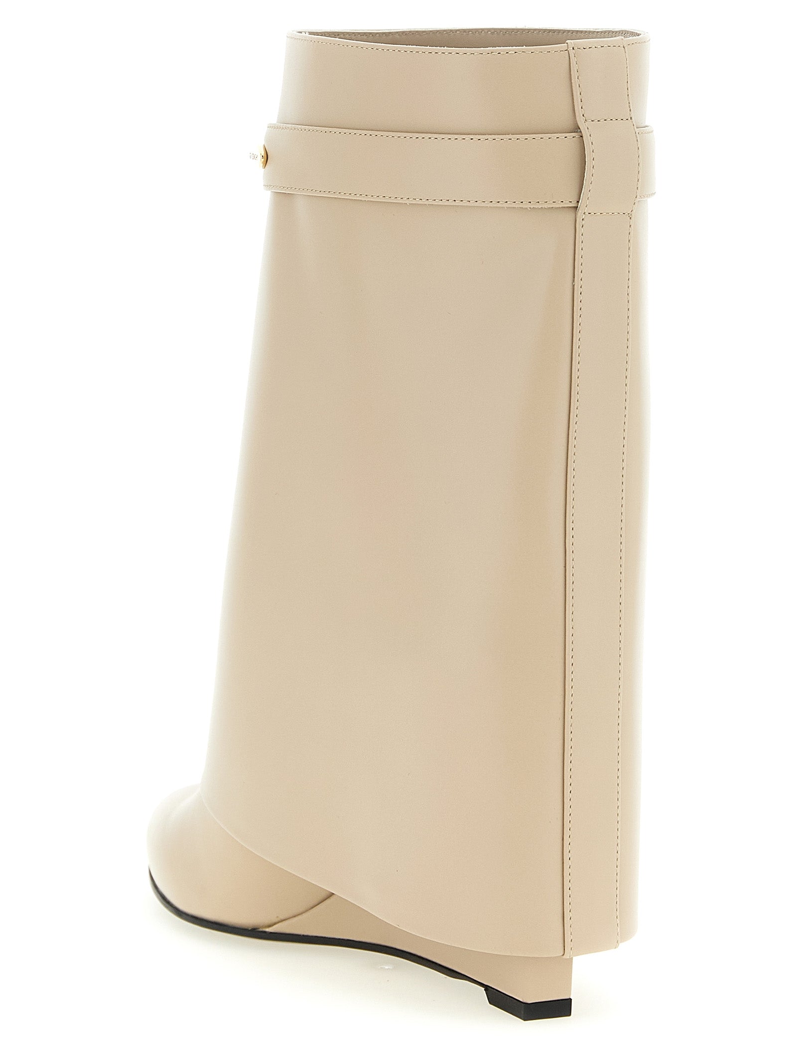 Wedge Ankle Boots by Givenchy for women in calfskin leather beige showcases a impeccable silhouette as Women's Calfskin Leather Wedge Ankle Boots, artfully defined by a impeccable wedge and a impeccable pointed toe style.