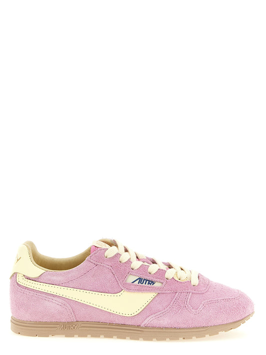 Athletic Sneakers by Autry for women in nylon cotton terry & suede cowhide leather multicolor, pink & jacquard features an effortless chic silhouette, showcasing the signature athletic style of the Women's Athletic Nylon Cotton Terry & Suede Cowhide Leather Sneakers collection with a truly effortless chic finish.