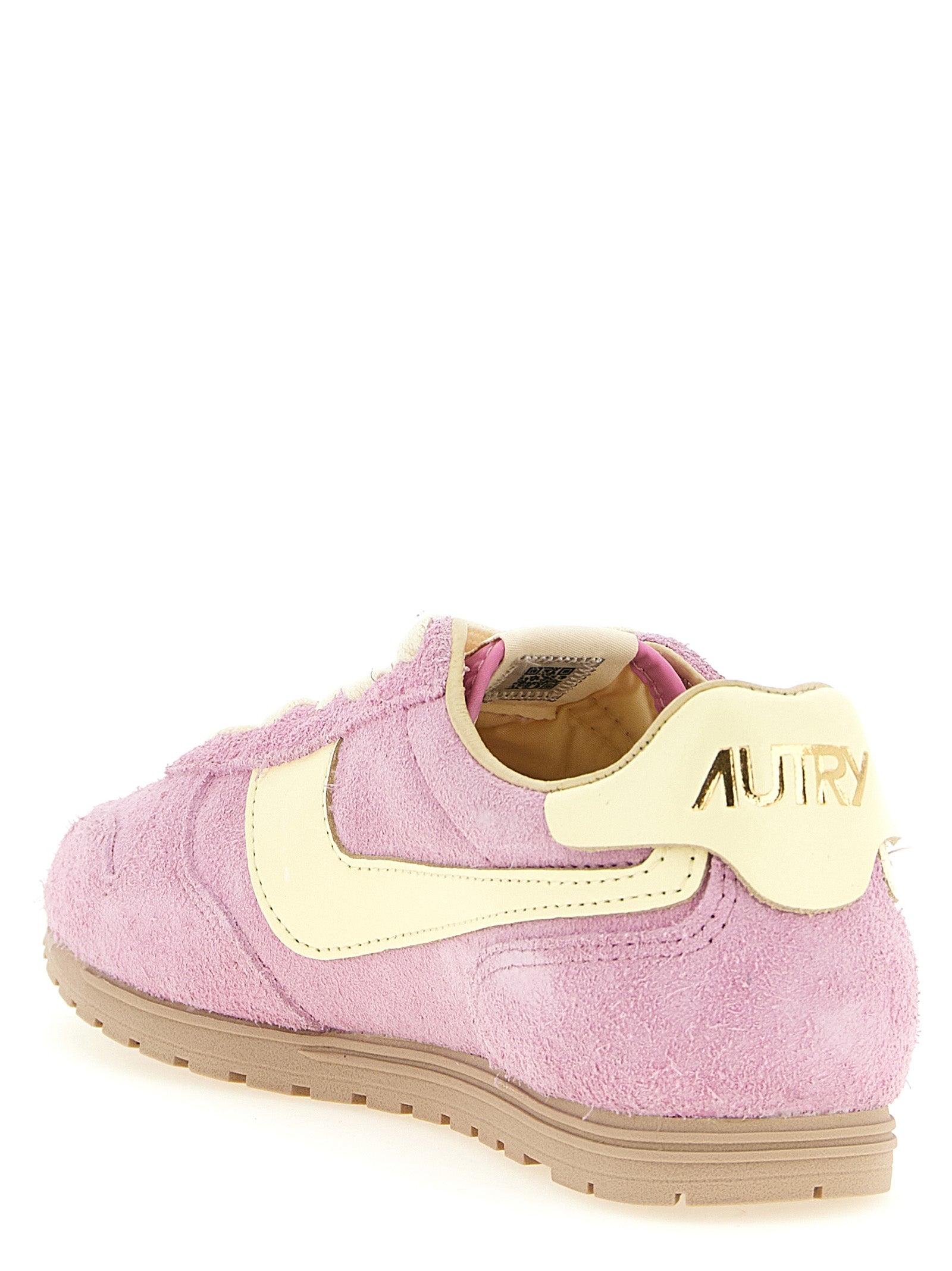Athletic Sneakers by Autry for women in nylon cotton terry & suede cowhide leather multicolor, pink & jacquard showcases a architectural silhouette, artfully capturing the essence of the Women's Athletic Nylon Cotton Terry & Suede Cowhide Leather Sneakers with its signature architectural athletic style construction.