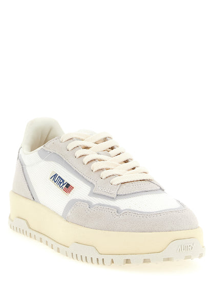 Sneakers by Autry for men in cotton terry suede leather & tu gray presents a impeccable silhouette as Cordura Men's Low Top Cotton Terry Suede Leather & TU Sneakers, expertly defined by a impeccable low-top style for a impeccable, high-fashion look.