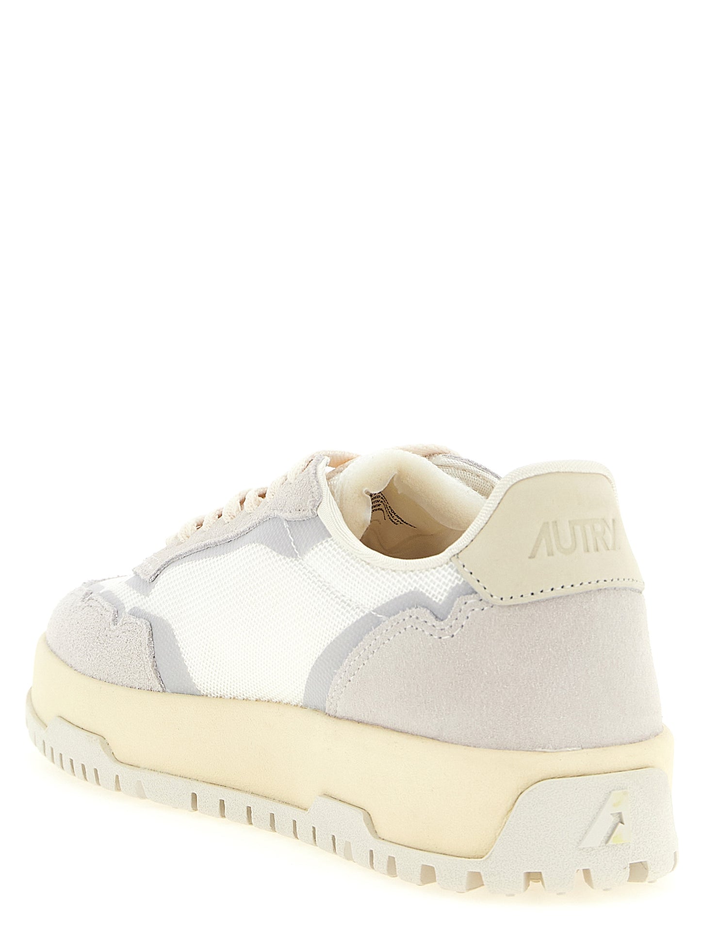 Sneakers by Autry for men in cotton terry suede leather & tu gray presents a sumptuous silhouette, artfully capturing the essence of the Cordura Men's Low Top Cotton Terry Suede Leather & TU Sneakers with its sumptuous low-top style design.