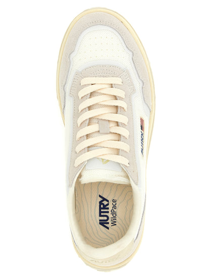 Sneakers by Autry for men in cotton terry suede leather & tu gray features an fashionable silhouette, showcasing the premium Cordura Men's Low Top Cotton Terry Suede Leather & TU Sneakers in a fashionable low-top style that offers a fashionable finish for refined style.