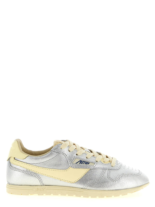 Sneakers by Autry for women in nylon cotton terry & cowhide leather natural, silver & jacquard presents a impeccable silhouette as Women's Low Top Nylon Cotton Terry & Cowhide Leather Sneakers, expertly defined by a impeccable low-top style for a impeccable, high-fashion look.