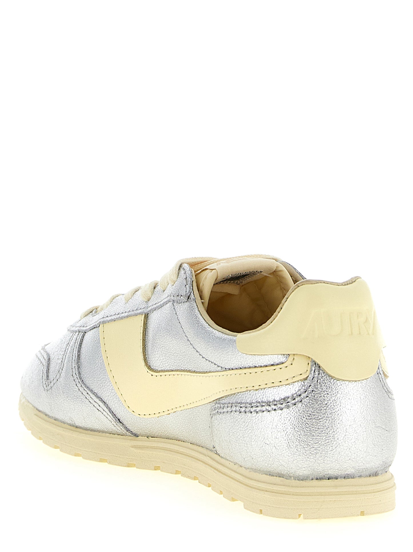 Sneakers by Autry for women in nylon cotton terry & cowhide leather natural, silver & jacquard features an versatile design from the Women's Low Top Nylon Cotton Terry & Cowhide Leather Sneakers collection, highlighting a versatile low-top style for a premium, high-fashion look.