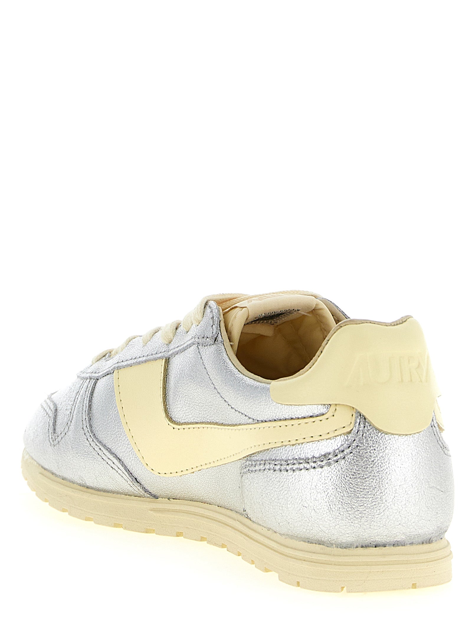 Sneakers by Autry for women in nylon cotton terry & cowhide leather natural, silver & jacquard features an versatile design from the Women's Low Top Nylon Cotton Terry & Cowhide Leather Sneakers collection, highlighting a versatile low-top style for a premium, high-fashion look.