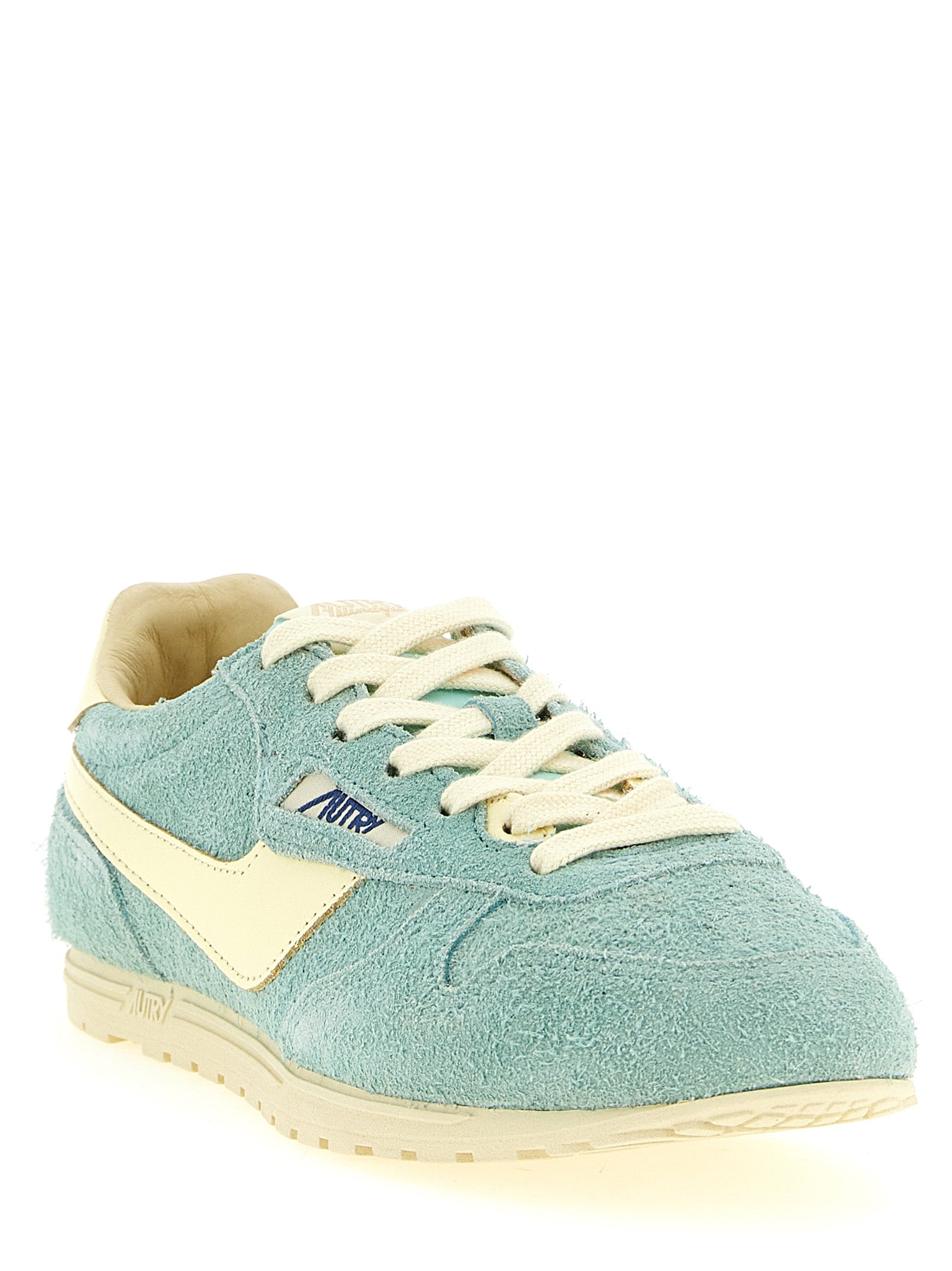 Sneakers by Autry for women in nylon cotton terry & suede cowhide leather light-blue & jacquard presents a on trend silhouette from the Women's Low Top Nylon Cotton Terry & Suede Cowhide Leather Sneakers collection, showcasing a on trend low-top style for an elevated aesthetic.