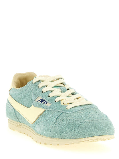 Sneakers by Autry for women in nylon cotton terry & suede cowhide leather light-blue & jacquard presents a on trend silhouette from the Women's Low Top Nylon Cotton Terry & Suede Cowhide Leather Sneakers collection, showcasing a on trend low-top style for an elevated aesthetic.