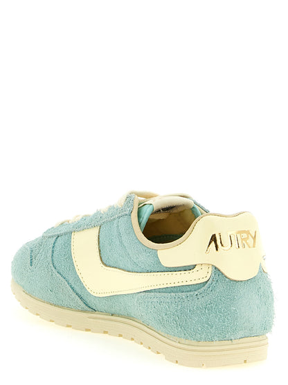 Sneakers by Autry for women in nylon cotton terry & suede cowhide leather light-blue & jacquard features a chic design, perfectly showcasing the chic low-top style of this Women's Low Top Nylon Cotton Terry & Suede Cowhide Leather Sneakers.
