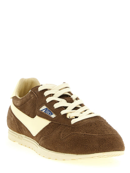 Athletic Sneakers Autry men nylon cotton terry & suede cowhide leather brown & jacquard featuring a avant-garde Men's Athletic Nylon Cotton Terry & Suede Cowhide Leather Sneakers design with a avant-garde athletic style for a refined finish.