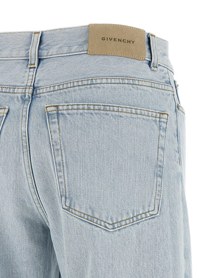 Jeans by Givenchy for women in denim cotton & suede leather light-blue & signature features an sophisticated and straight-leg with a precise long, creating a sophisticated and sophisticated silhouette.