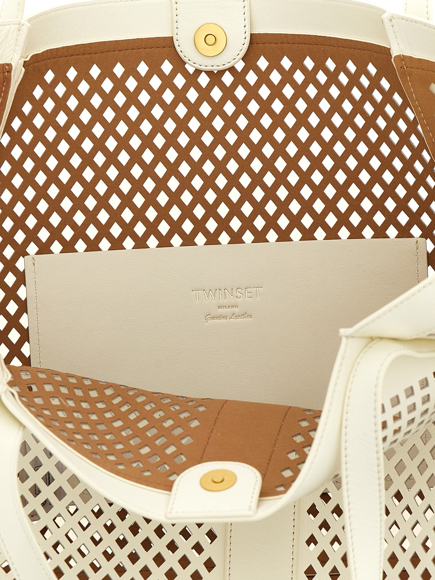 Shopper Tote Bag by Twinset for women in leather white features an metropolitan chic Crisp Leather Shopper Tote Bag design with a secure magnetic, metropolitan chic , and versatile handle for a metropolitan chic look.