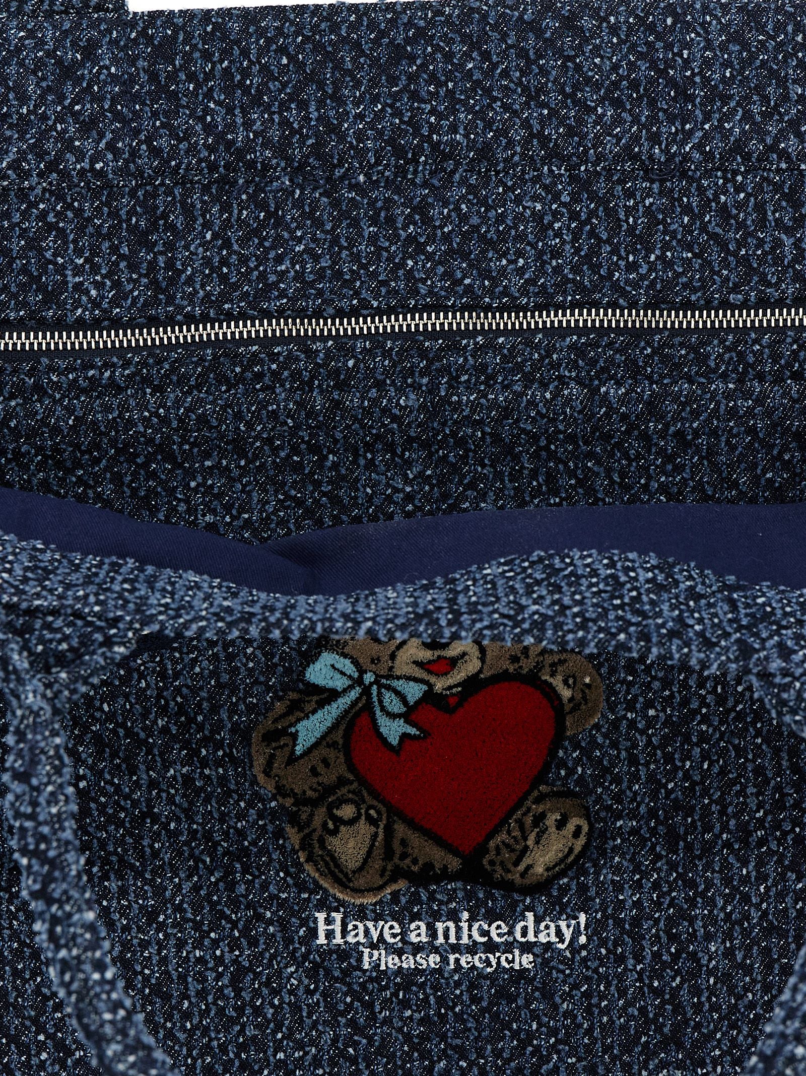 Shopper Tote Bag by Ganni for women in tweed organic cotton denim blue showcases a urban-chic Bear Tweed Organic Cotton Denim Shopper Tote Bag design, featuring a secure , ample , and versatile handle for a urban-chic finish.