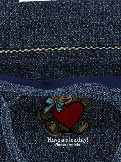Shopper Tote Bag by Ganni for women in tweed organic cotton denim blue showcases a urban-chic Bear Tweed Organic Cotton Denim Shopper Tote Bag design, featuring a secure , ample , and versatile handle for a urban-chic finish.
