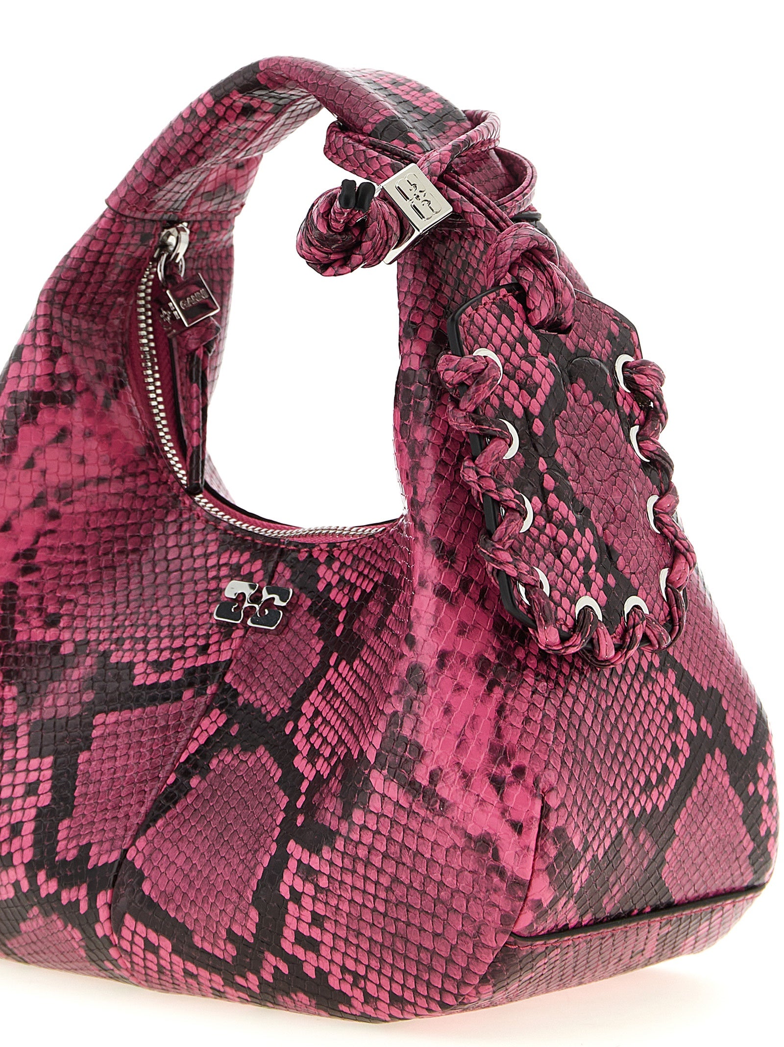 Mini Hobo Handbag by Ganni for women in pebbled poly leather fuchsia & print features a ornamental silhouette, showcasing a secure zipper, ample , and ornamental shoulder-strap, adjustable-strap & handle for a sophisticated look.