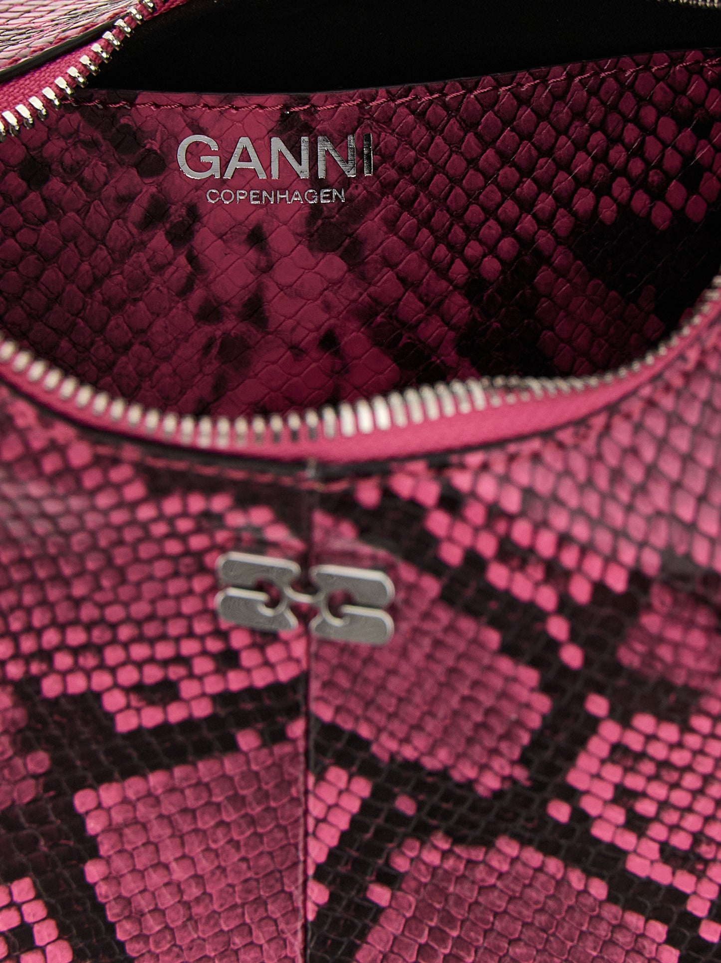 Mini Hobo Handbag by Ganni for women in pebbled poly leather fuchsia & print features a signature silhouette, showcasing a secure zipper and signature with versatile shoulder-strap, adjustable-strap & handle for a sophisticated look.