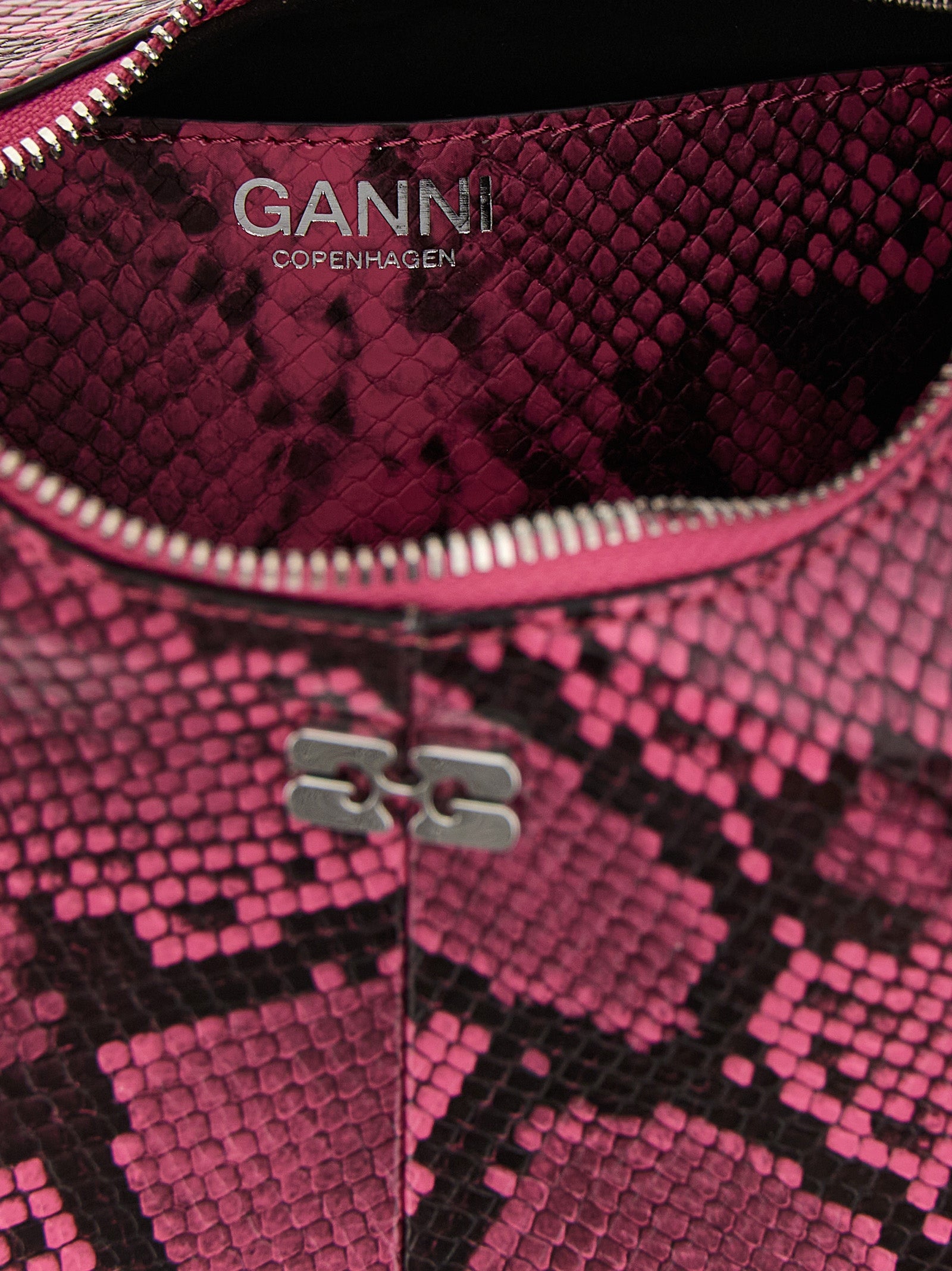 Mini Hobo Handbag by Ganni for women in pebbled poly leather fuchsia & print features a signature silhouette, showcasing a secure zipper and signature with versatile shoulder-strap, adjustable-strap & handle for a sophisticated look.