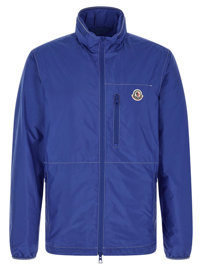 Hooded Windbreaker Jacket by Moncler for men in nylon felt blue & signature features an magnificent silhouette, showcasing the sophisticated hooded neckline and functional pockets, hooded & windproof for a premium, magnificent look.