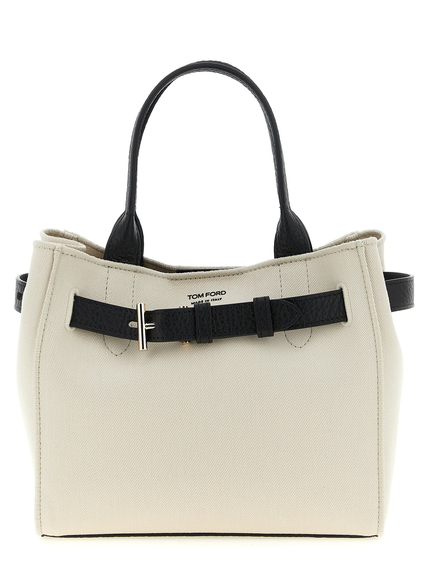 This Shopper Tote Bag by Tom Ford for women in cotton polyester canvas bicolour, black & white features an jet-set Audrey Cotton Polyester Canvas Shopper Tote Bag design with a secure magnetic & buckle, ample , and jet-set shoulder-strap, adjustable-strap & handle.