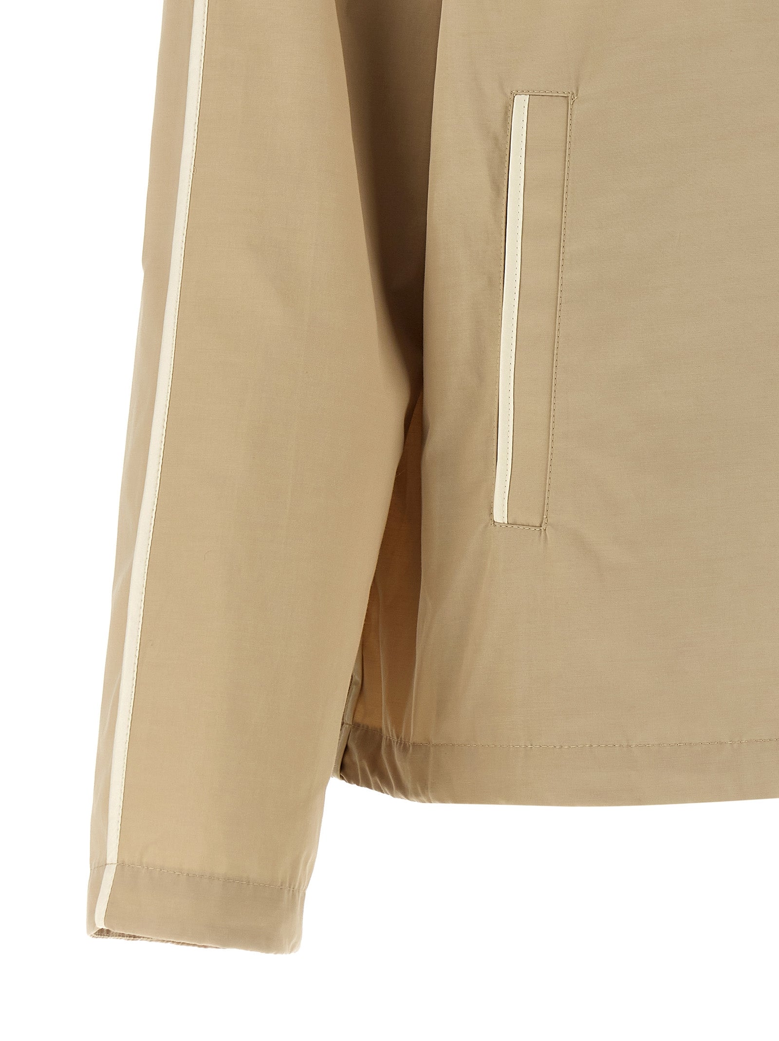 Hooded Windbreaker Jacket by Moncler for women in cotton polyester beige & signature features an magnificent silhouette, showcasing the sophisticated and functional pockets, hooded & windproof for a premium, magnificent look.