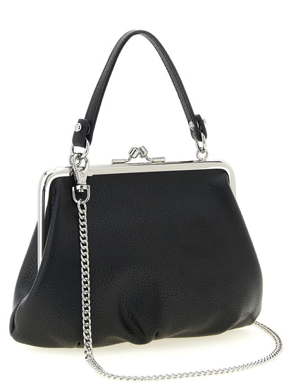 This Frame Handbag by Vivienne Westwood for women in pvc cotton polyester and black & signature presents a sculptural silhouette featuring a secure snap, ample , and versatile shoulder-strap & handle for a sculptural finish.