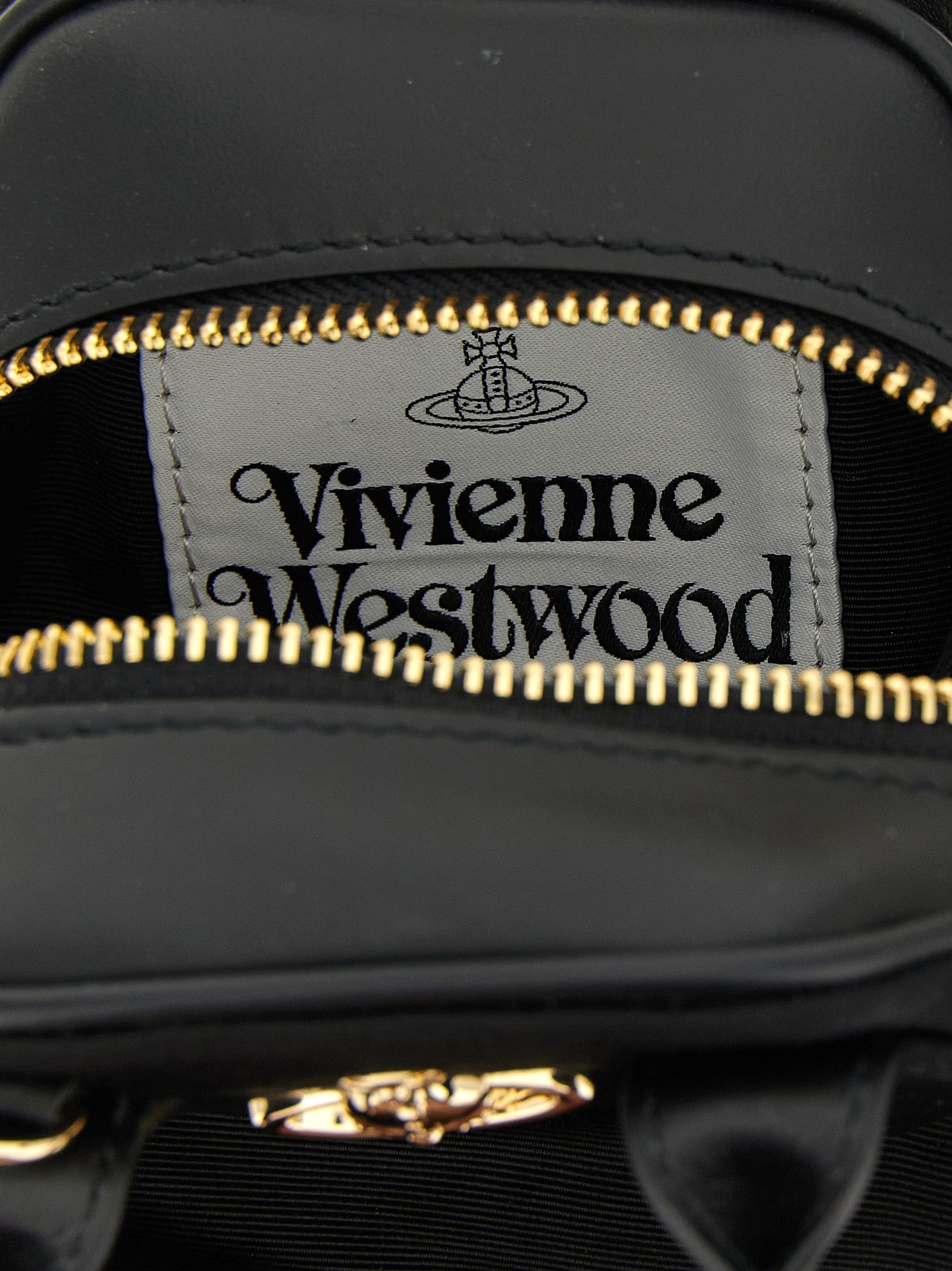 Mini Handbag by Vivienne Westwood for women in viscose & rubber black features a signature silhouette, showcasing a secure zipper and signature with versatile shoulder-strap, adjustable-strap & handle for a sophisticated look.