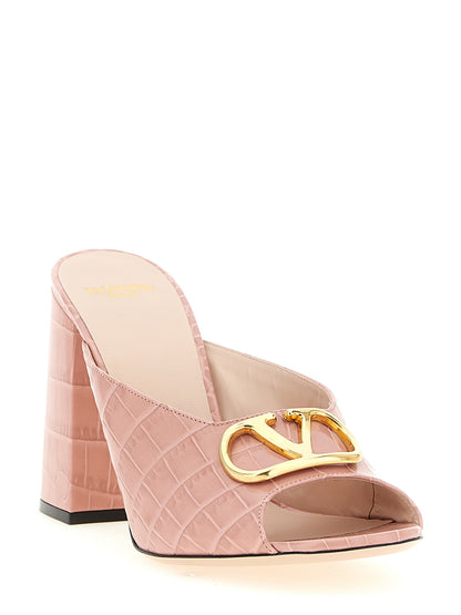 Stiletto Slider Sandals by Valentino Garavani for women in crocodile calfskin leather multicolor, pink & signature features an statuesque V Logo Women's Crocodile Calfskin Leather Stiletto Slider Sandals silhouette with a refined stiletto and elegant .