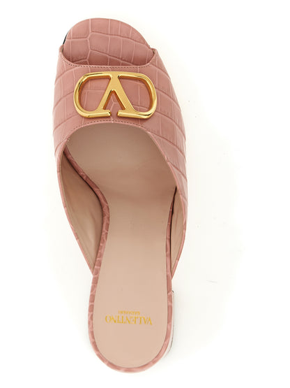 Stiletto Slider Sandals by Valentino Garavani for women in crocodile calfskin leather multicolor, pink & signature features an effortlessly chic silhouette from the V Logo Women's Crocodile Calfskin Leather Stiletto Slider Sandals collection, showcasing a effortlessly chic stiletto and elegant .