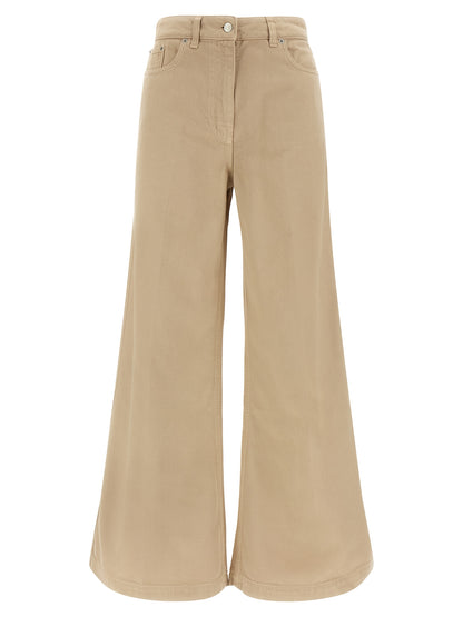 Trousers by NUDE for women in cotton beige, nude & signature features an sartorial silhouette, showcasing a precise flared and long with a sartorial for a refined look.