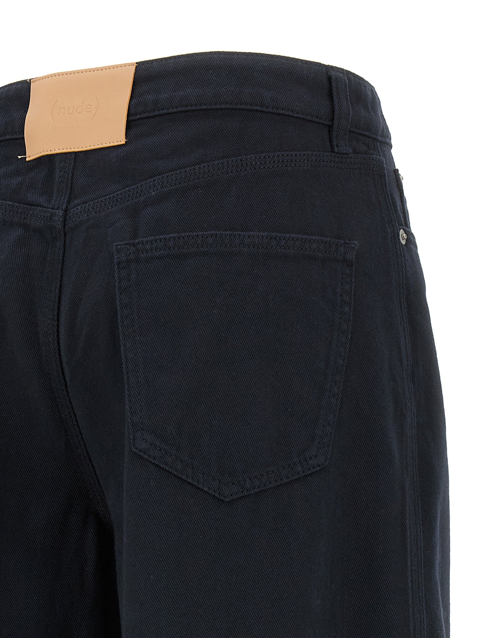 Trousers by NUDE for women in cotton blue & nude features a sculptural silhouette, showcasing a sculptural flared and long with a sophisticated for a sculptural finish.