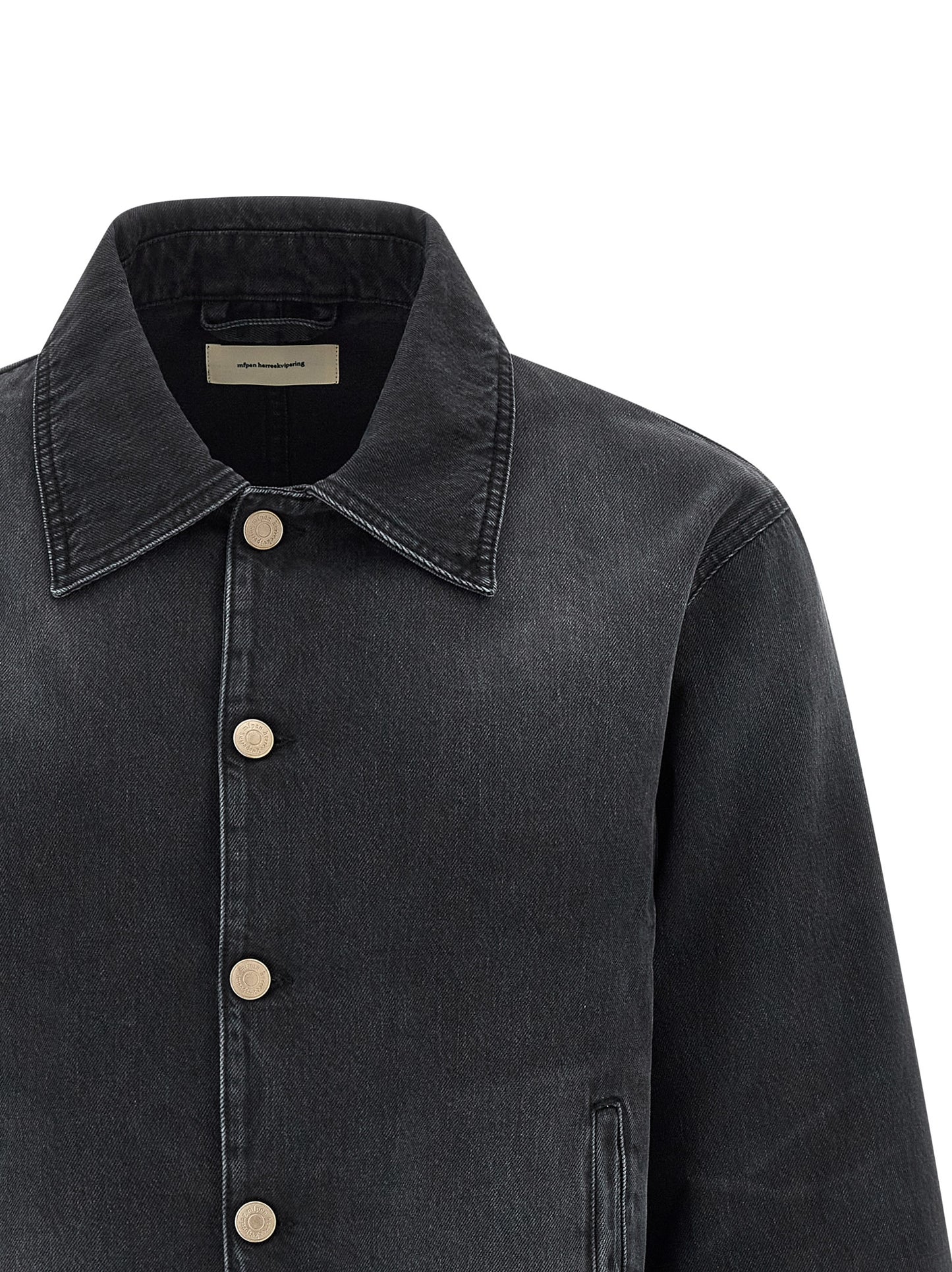 Trucker Jacket by MFPEN for men in organic cotton denim black features a dramatic silhouette, showcasing a sophisticated shirt-collar neckline and distinctive pockets for a dramatic aesthetic.