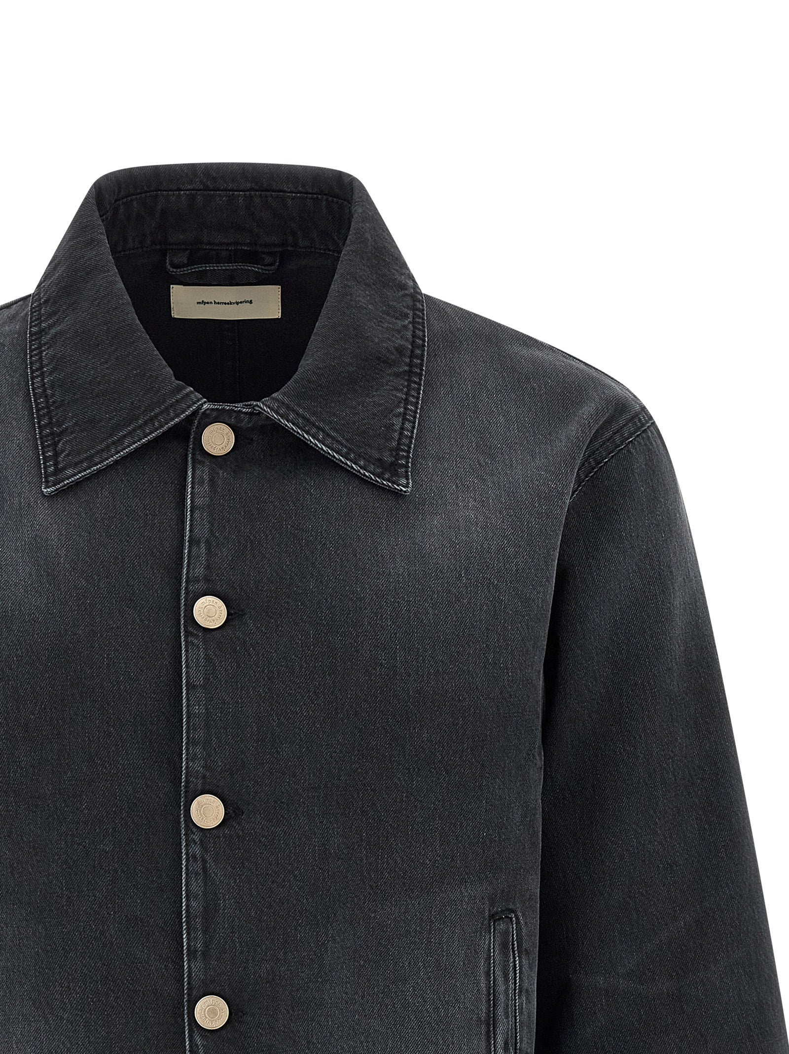 Trucker Jacket by MFPEN for men in organic cotton denim black features a dramatic silhouette, showcasing a sophisticated shirt-collar neckline and distinctive pockets for a dramatic aesthetic.