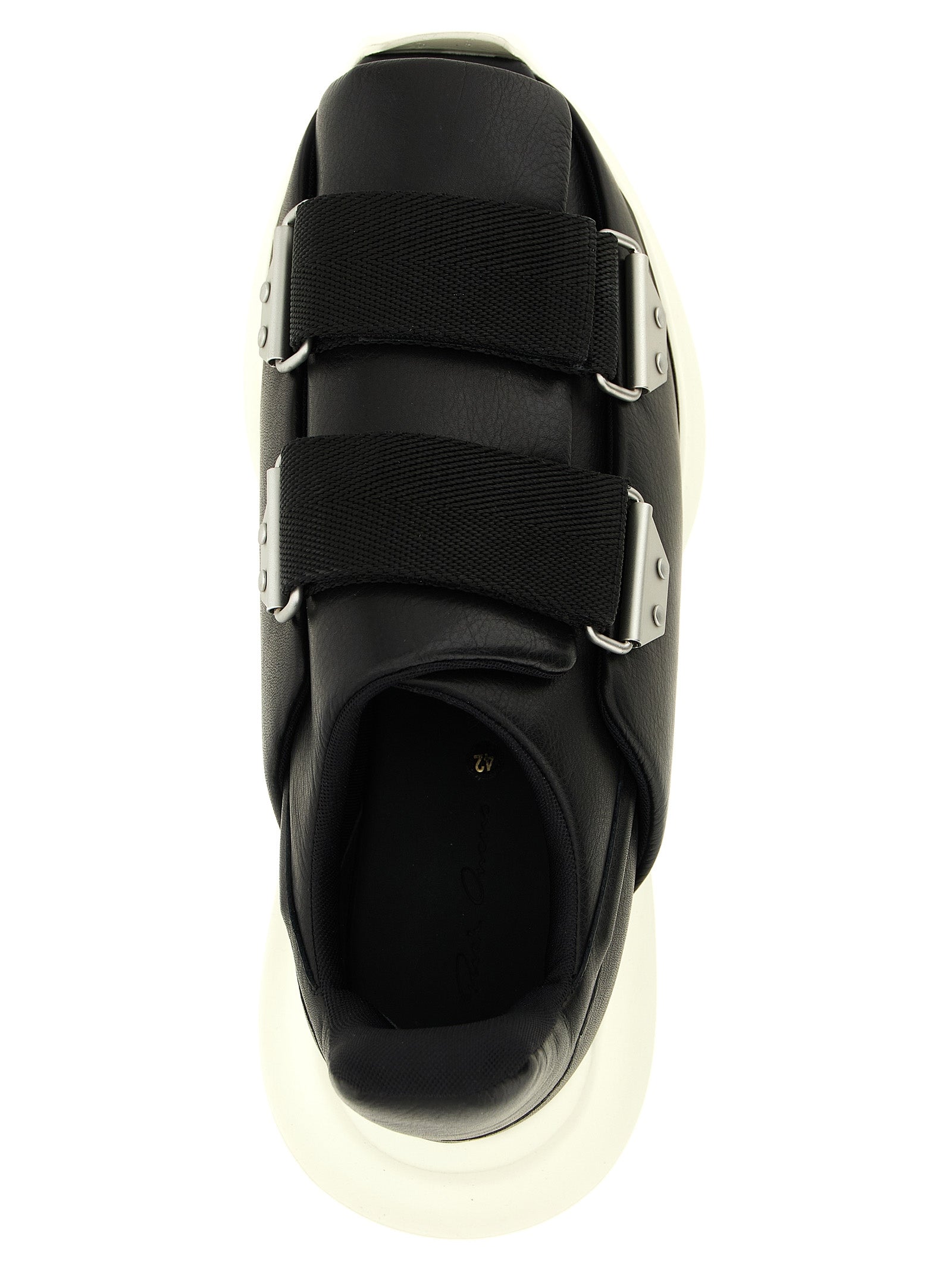 Athletic Sneakers by Rick Owens for men in cotton & bos taurus cowhide leather black showcases a architectural silhouette, artfully capturing the essence of the Men's Athletic Cotton & Bos Taurus Cowhide Leather Sneakers with its signature architectural athletic style construction.