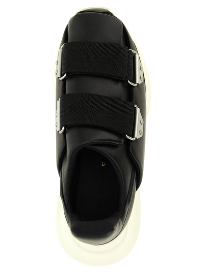 Athletic Sneakers by Rick Owens for men in cotton & bos taurus cowhide leather black showcases a architectural silhouette, artfully capturing the essence of the Men's Athletic Cotton & Bos Taurus Cowhide Leather Sneakers with its signature architectural athletic style construction.