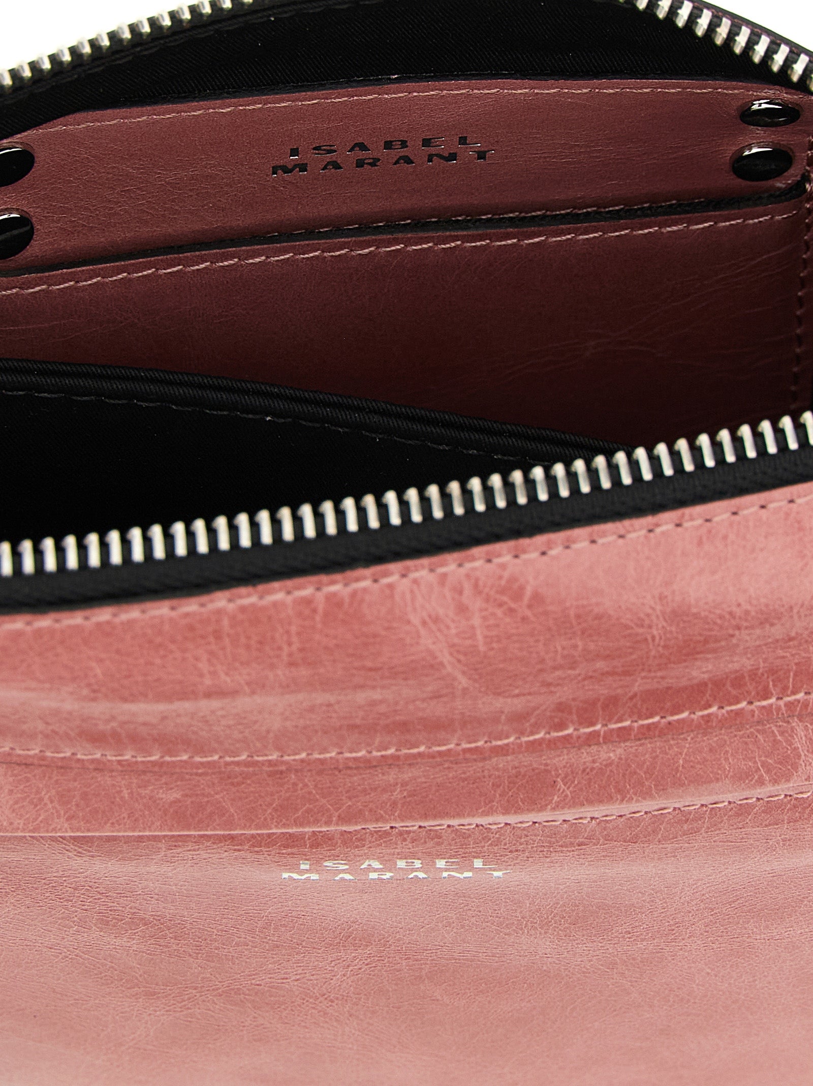 Crossbody Handbag by Isabel Marant for women in calfskin leather multicolor & pink features a versatile chic silhouette, meticulously detailed with a secure zipper, ample , and versatile crossbody-strap, shoulder-strap & adjustable-strap.