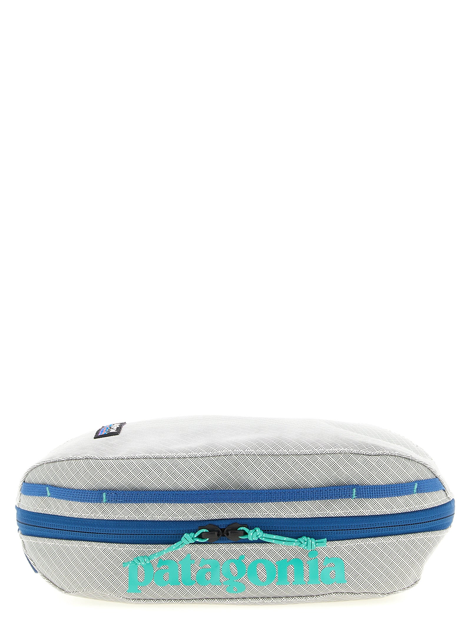 Toiletry Bag by PATAGONIA for men in tu & polyester black, gray & print features an chic Black Hole TU & Polyester Toiletry Bag design with a secure zipper, chic , and versatile handle.