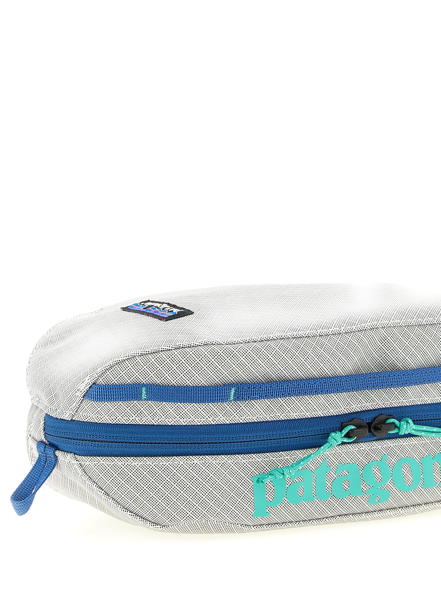 Toiletry Bag by PATAGONIA for men in tu & polyester black, gray & print presents a edgy silhouette, showcasing the Black Hole TU & Polyester Toiletry Bag with a secure zipper, ample , and versatile handle.