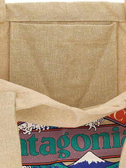 Shopper Tote Bag by PATAGONIA for men in cotton polyester canvas beige & print features an jet-set-ready silhouette, showcasing the Market Cotton Polyester Canvas Shopper Tote Bag design with a secure , ample , and versatile handle.