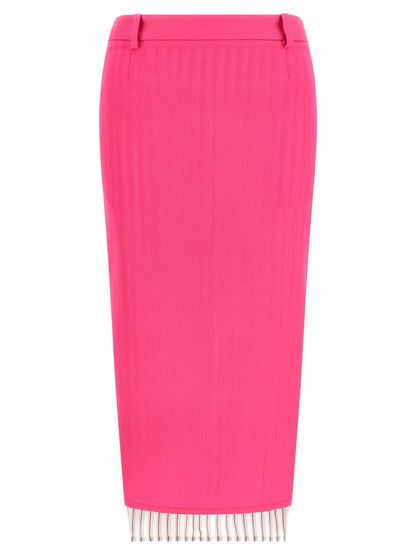 Skirt by The Attico for women in virgin wool fuchsia & striped features an relaxed-yet-refined silhouette that elegantly showcases the Women's Asymmetrical Virgin Wool Skirt design and sophisticated midi.