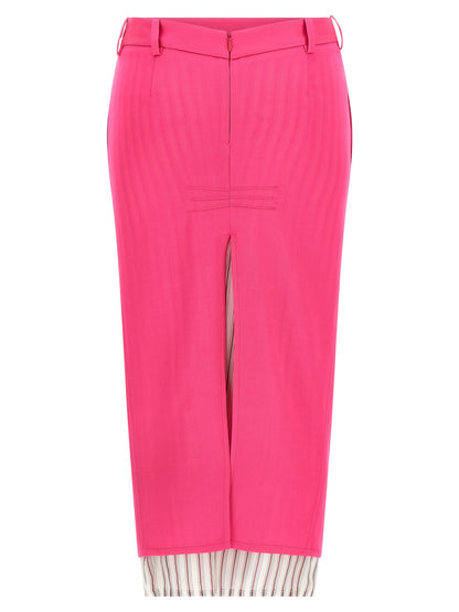 Skirt by The Attico for women in virgin wool fuchsia & striped showcases a dramatic silhouette, artfully capturing the essence of the Women's Asymmetrical Virgin Wool Skirt in a dramatic midi cut for a refined look.