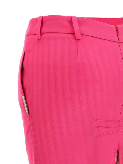 Skirt by The Attico for women in virgin wool fuchsia & striped features an tailored silhouette, artfully capturing the essence of Women's Asymmetrical Virgin Wool Skirt in a sophisticated midi.