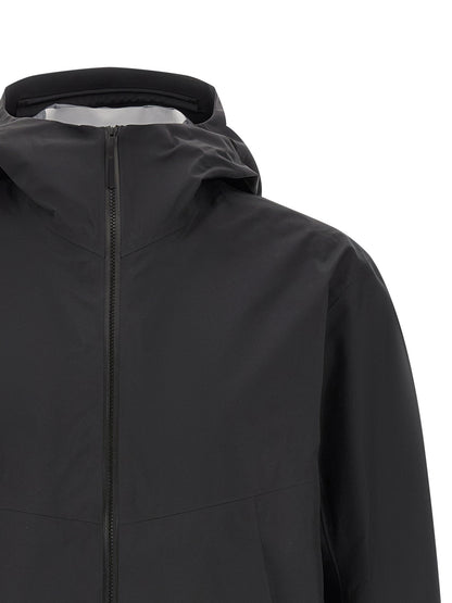 Hooded Windbreaker Jacket by Arc'teryx Veilance for men in nylon black features an magnificent silhouette, showcasing the sophisticated hooded high-neck neckline and functional breathable-design, water-resistant, windproof & hooded for a premium, magnificent look.